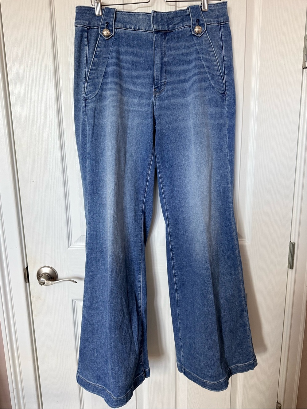 White House Black Market Medium Wash Flared Jeans